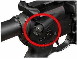 AR 15 Forward Assist AR15 forward assist with red circle around it